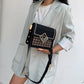 Western style chain cross-body bag